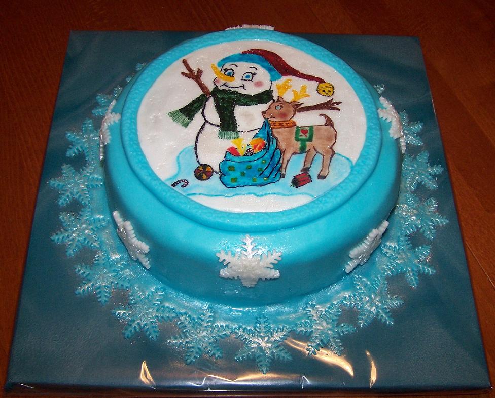 Zimní dortík s malovaným sněhuláčkem.